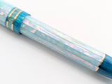 Carina Ragazzone in Iceberg Awabi Shell w/ Teal Pearl Resin
