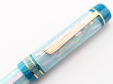 Carina Ragazzone in Iceberg Awabi Shell w/ Teal Pearl Resin
