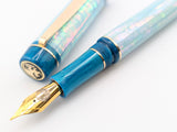 Carina Ragazzone in Iceberg Awabi Shell w/ Teal Pearl Resin