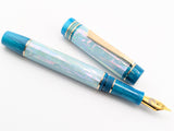 Carina Ragazzone in Iceberg Awabi Shell w/ Teal Pearl Resin