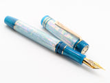 Carina Ragazzone in Iceberg Awabi Shell w/ Teal Pearl Resin