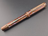 Carina Ragazzone in Root Beer and Copper Striped Awabi w/ Chocolate Pearl Resin