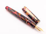 Carina 15 in Multi Colored Tortoiseshell Cellulose Acetate - Mokume Gane